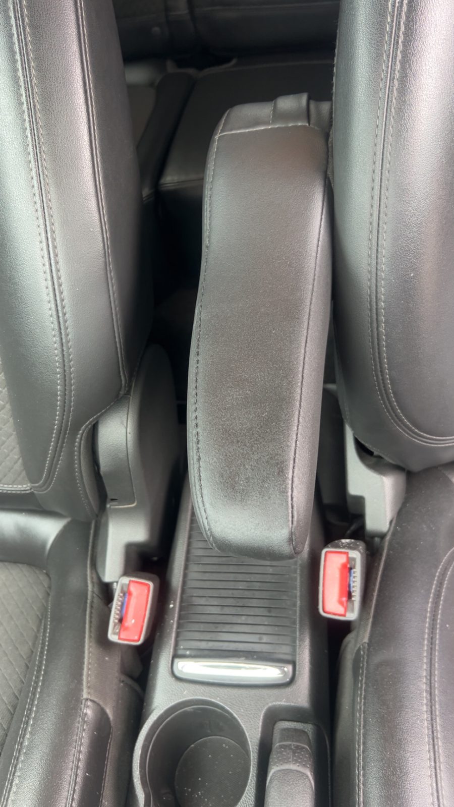 Center console armrest after repair